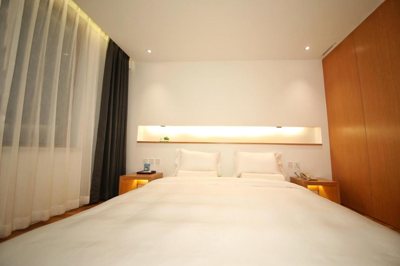 Bejing Zimei Hotel Beijing Bagian luar foto